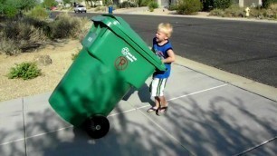 'Recycle Kid waiting for the garbage truck in Mesa Arizona'