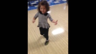 'First time bowling toddler knocks down all pins and starts dancing kids video'