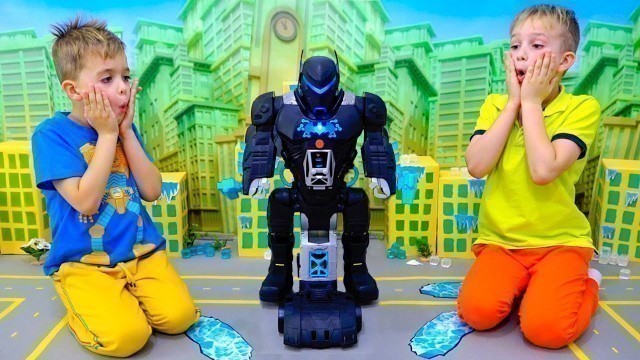 'Vlad and Niki play with Bat-Tech BatBot kids toy and save the city'