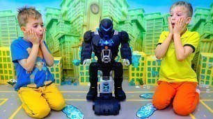 'Vlad and Niki play with Bat-Tech BatBot kids toy and save the city'