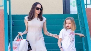 Angelina Jolie looks as though she’s started Christmas shopping with youngest daughter Vivienne