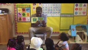 AMIKids PCMI students reading to pre-k kids for their summer reading program. What sound does ...