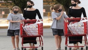 Angelina Jolie proves she is just a regular mom as she takes daughter Vivienne to pick up school sup