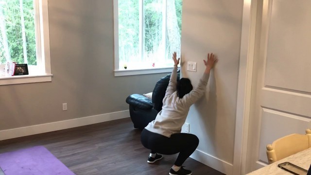 'Hands Up Wall Squat - Forge Valley Fitness'