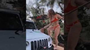 'Hot Fitness model washing Jeep in bikini 