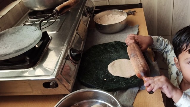 'My Aryash making roti/ chapati Lol