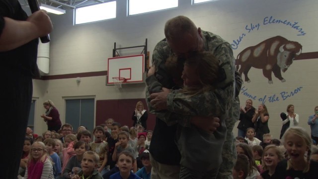 'Sergeant surprises his kids at school assembly'