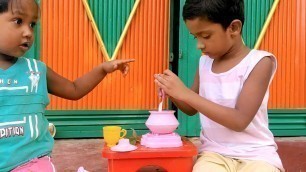 'kids cooking outdoor in village with Pat a Cake Song'