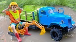 'RC Car Stuck in the Mud Darius Helped with the Excavator Toy'