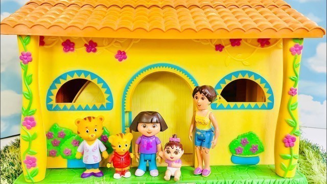 'Daniel Tiger VISITS Dora The Explorer Talking Dollhouse Learning SPANISH Toys Videos For Kids'