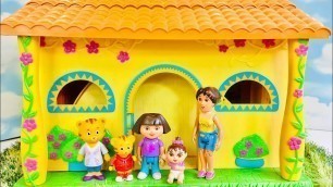 'Daniel Tiger VISITS Dora The Explorer Talking Dollhouse Learning SPANISH Toys Videos For Kids'