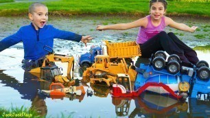 'Playing with Toys in the Mud! Bruder Dump Trucks, Diggers, and Excavators for Kids | JackJackPlays'