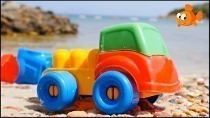 'SAND TOWN! - Sand Castles & Toy Trucks for kids - Sandbox toys for beach - videos for kids'