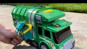 'Toy Garbage Trucks in Action'